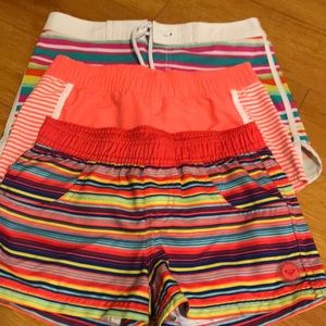 3 pairs Roxy girl sz M 8-10 board shorts.